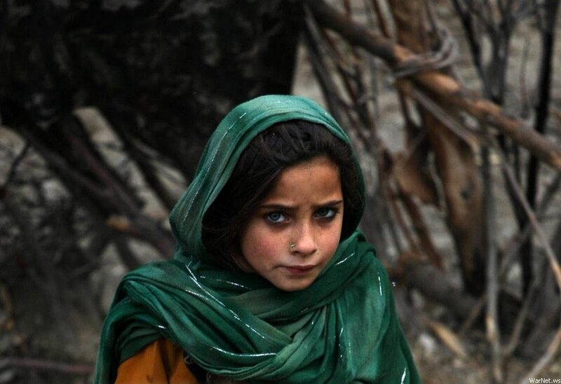 Afghan girl in green headscarf