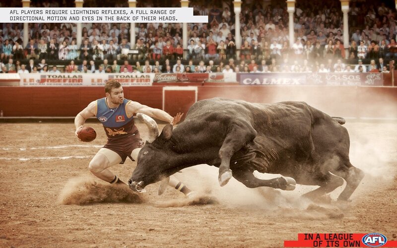 AFL Player Dodging Bull — Brown, Dramatic