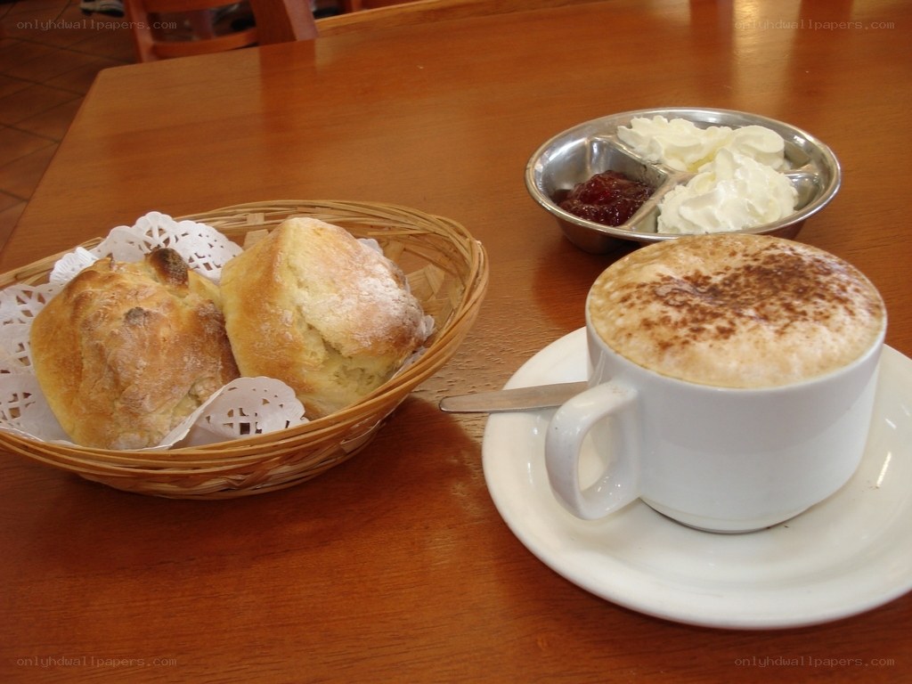 Afternoon tea with scones and coffee