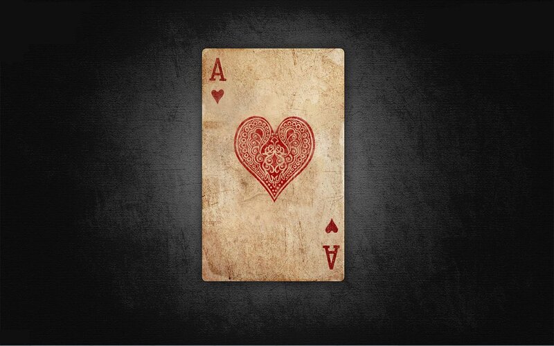 Aged ace of hearts card