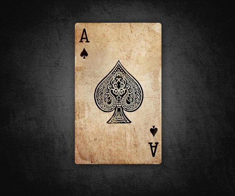 Aged ace of spades card