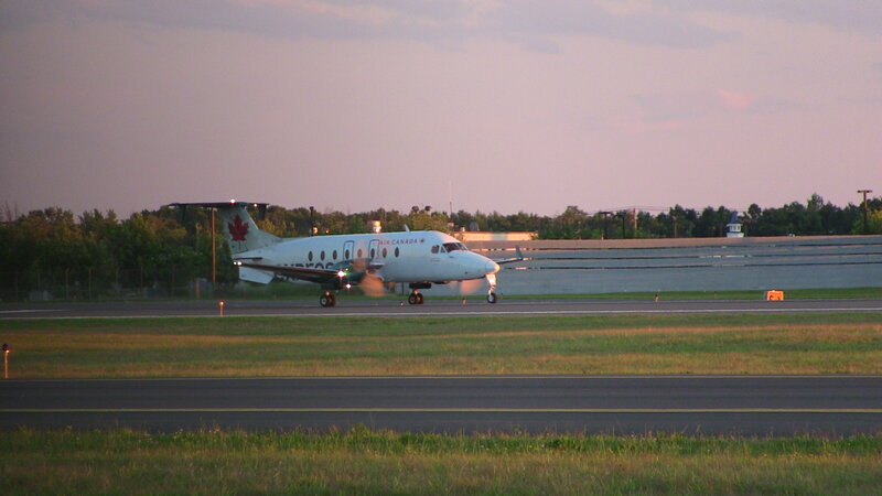 Air Canada Plane on Runway — White