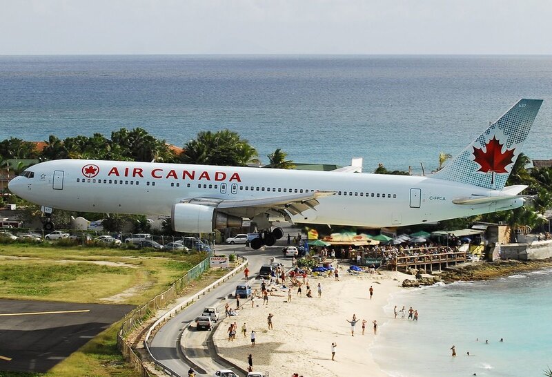 Air Canada plane over beach