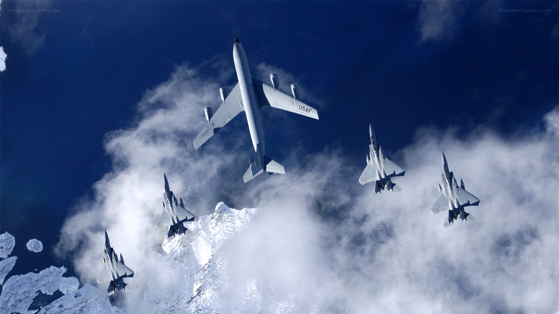 Air Force jets flying over mountains