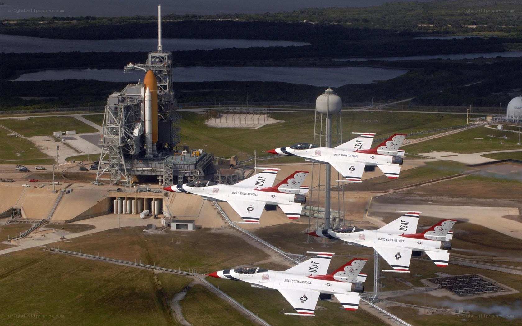 Air Force Thunderbirds fly over shuttle launch