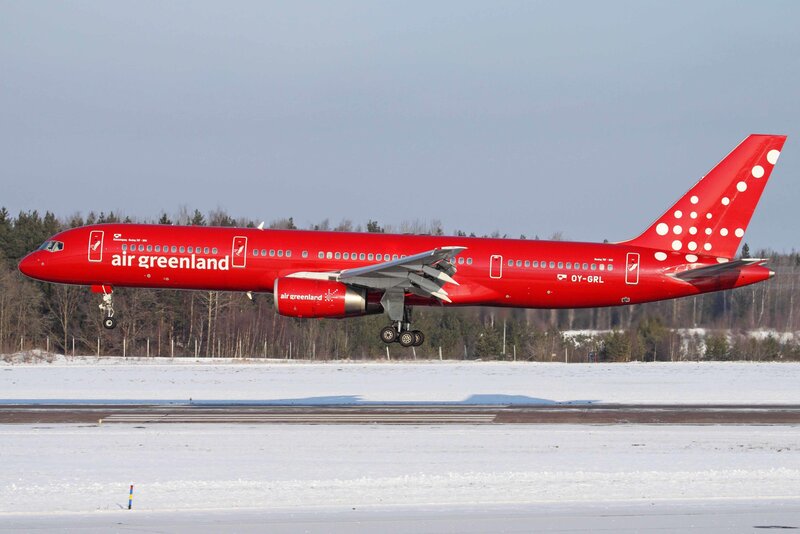 Air Greenland airplane on snowy runway