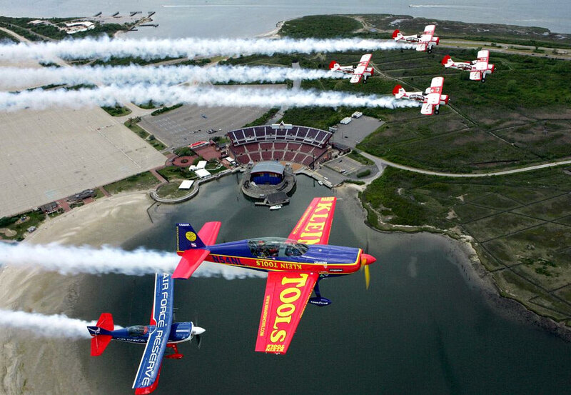 Air show aerobatics over water