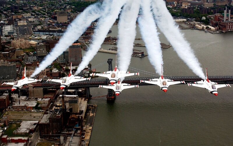 Air show over city bridge