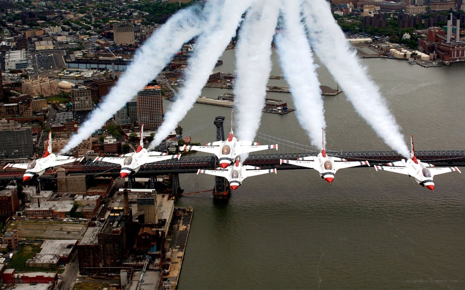 Air show over city bridge