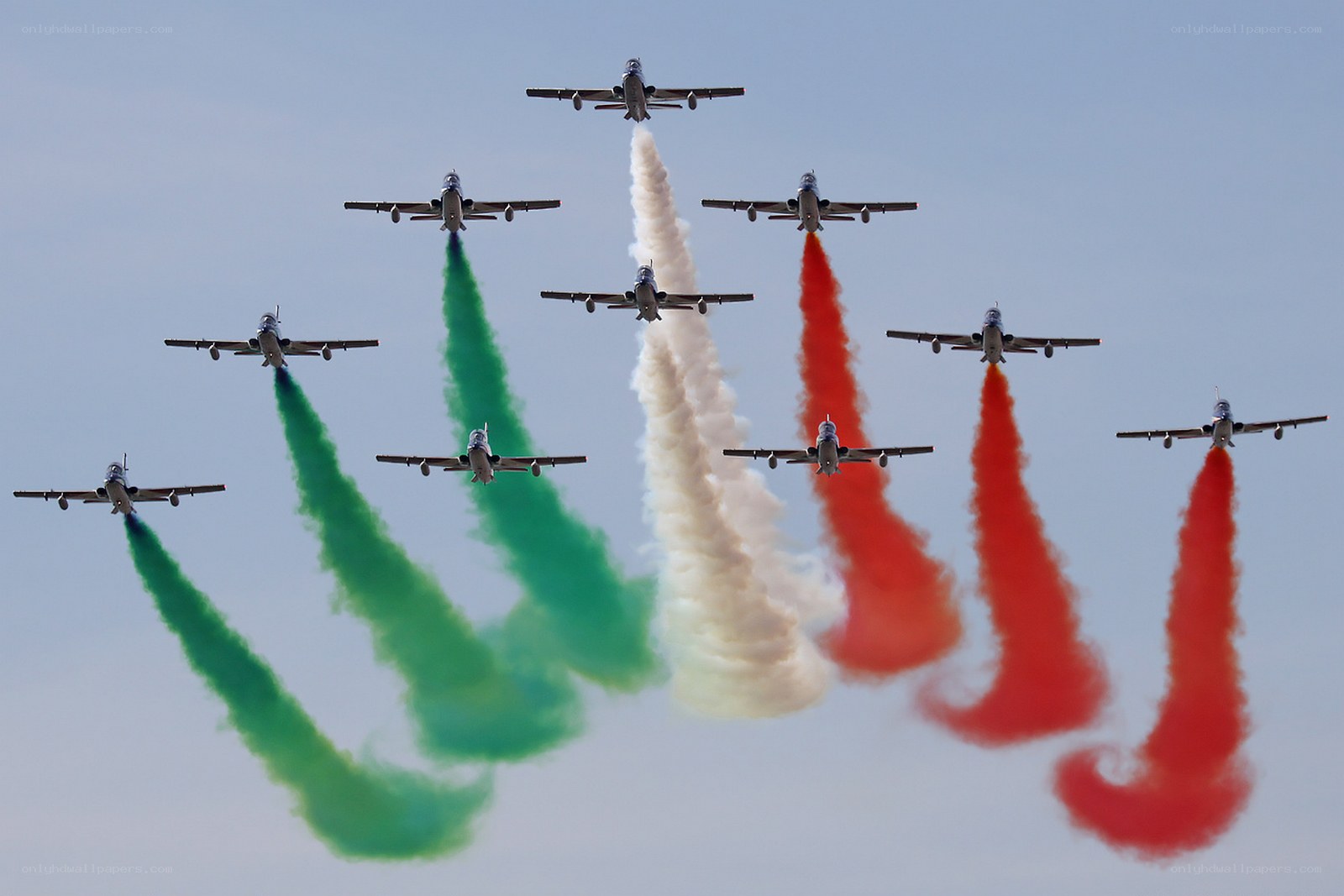 air show with colored smoke