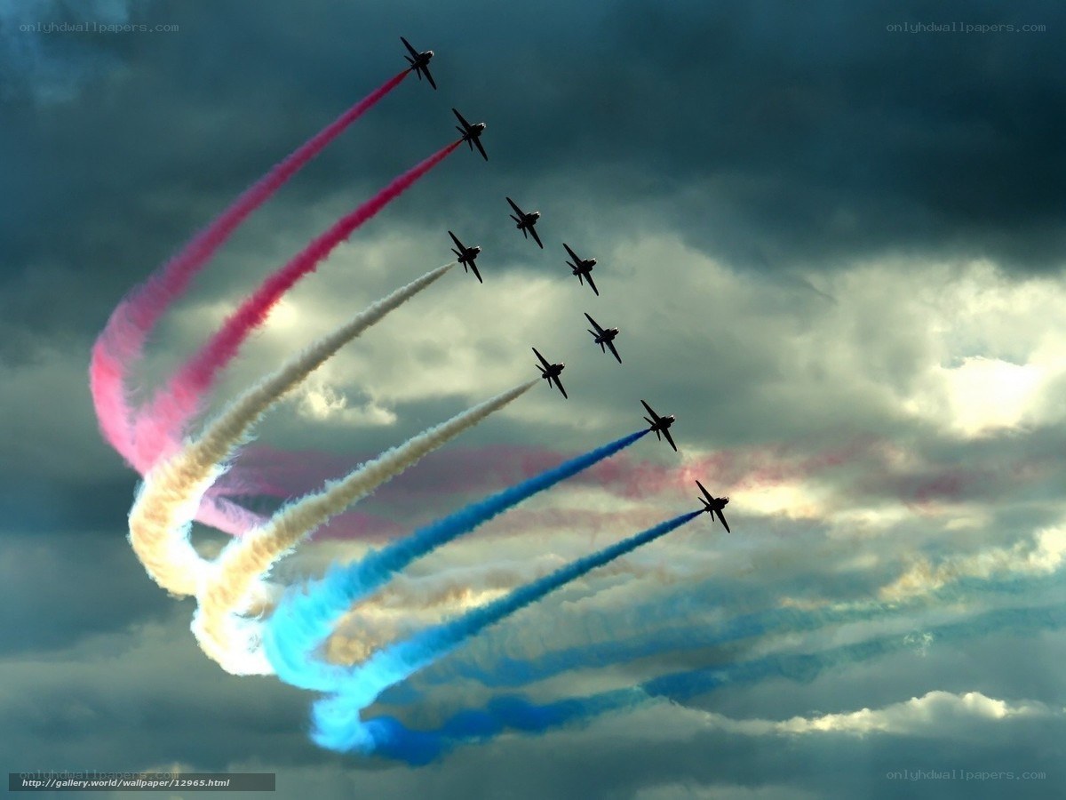 Air show with colored smoke trails