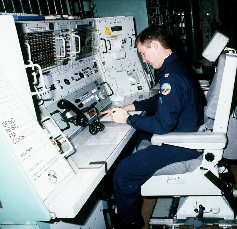 Air traffic controller at console
