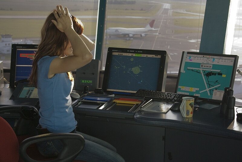 Air Traffic Controller at Desk