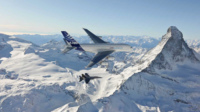 Airbus A380 over snowy mountains