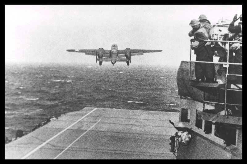 aircraft approaching aircraft carrier
