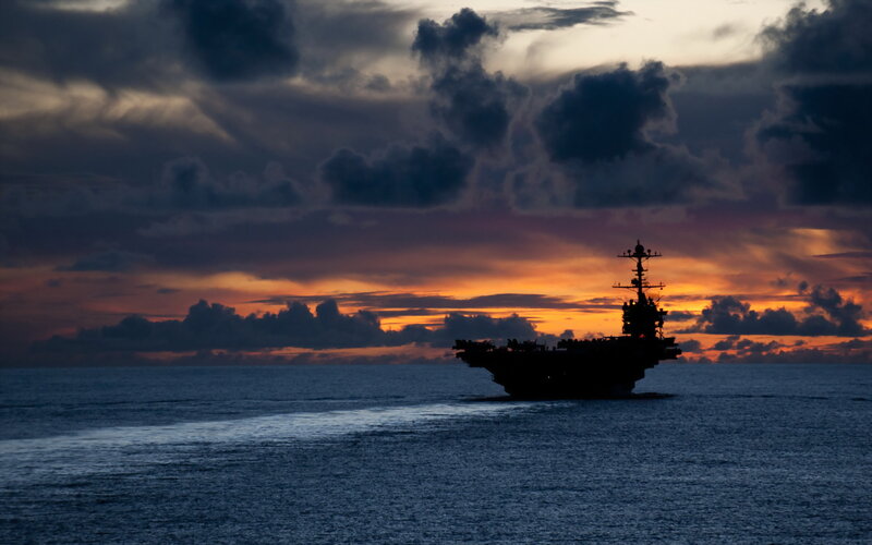Aircraft Carrier at Sea — Blue, Dramatic, Sunset