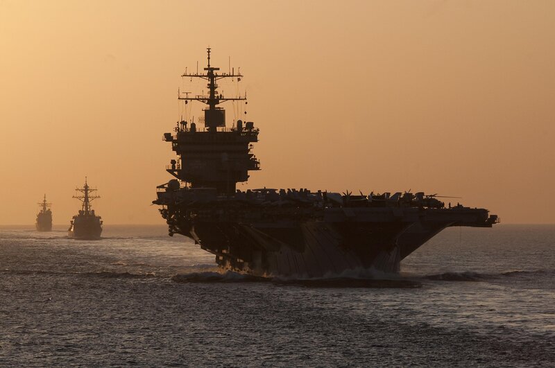 Aircraft Carrier at Sea — Orange, Dramatic, Sunset