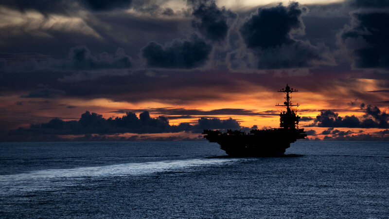 Aircraft Carrier at Sea — Orange, Dramatic
