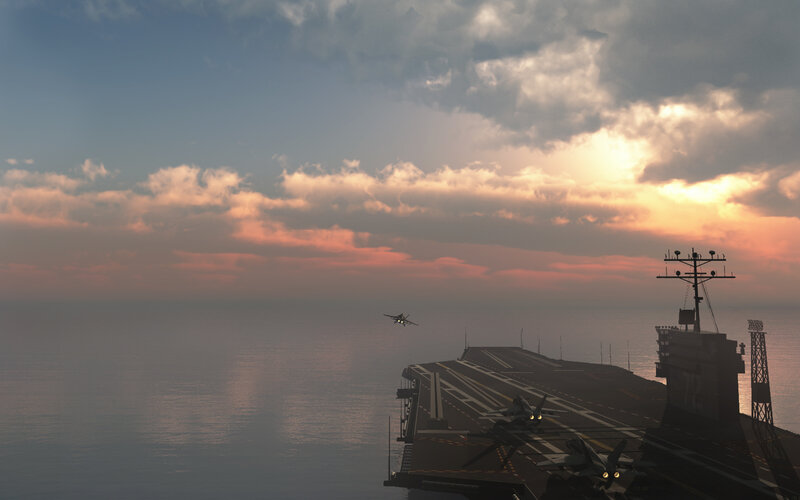 Aircraft carrier at sunset