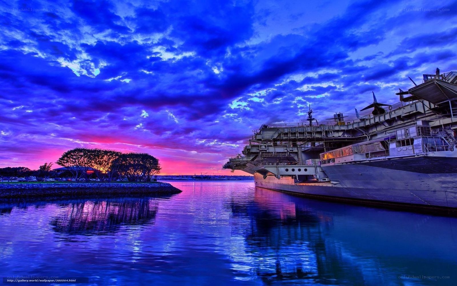 Aircraft carrier at sunset