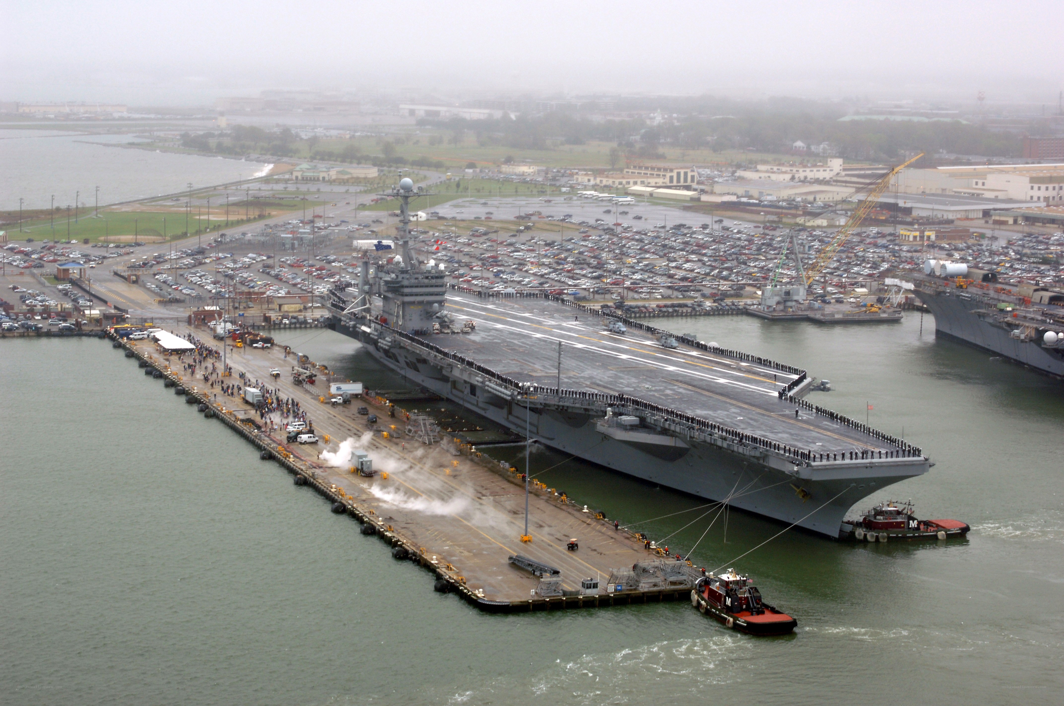 Aircraft carrier docked at port