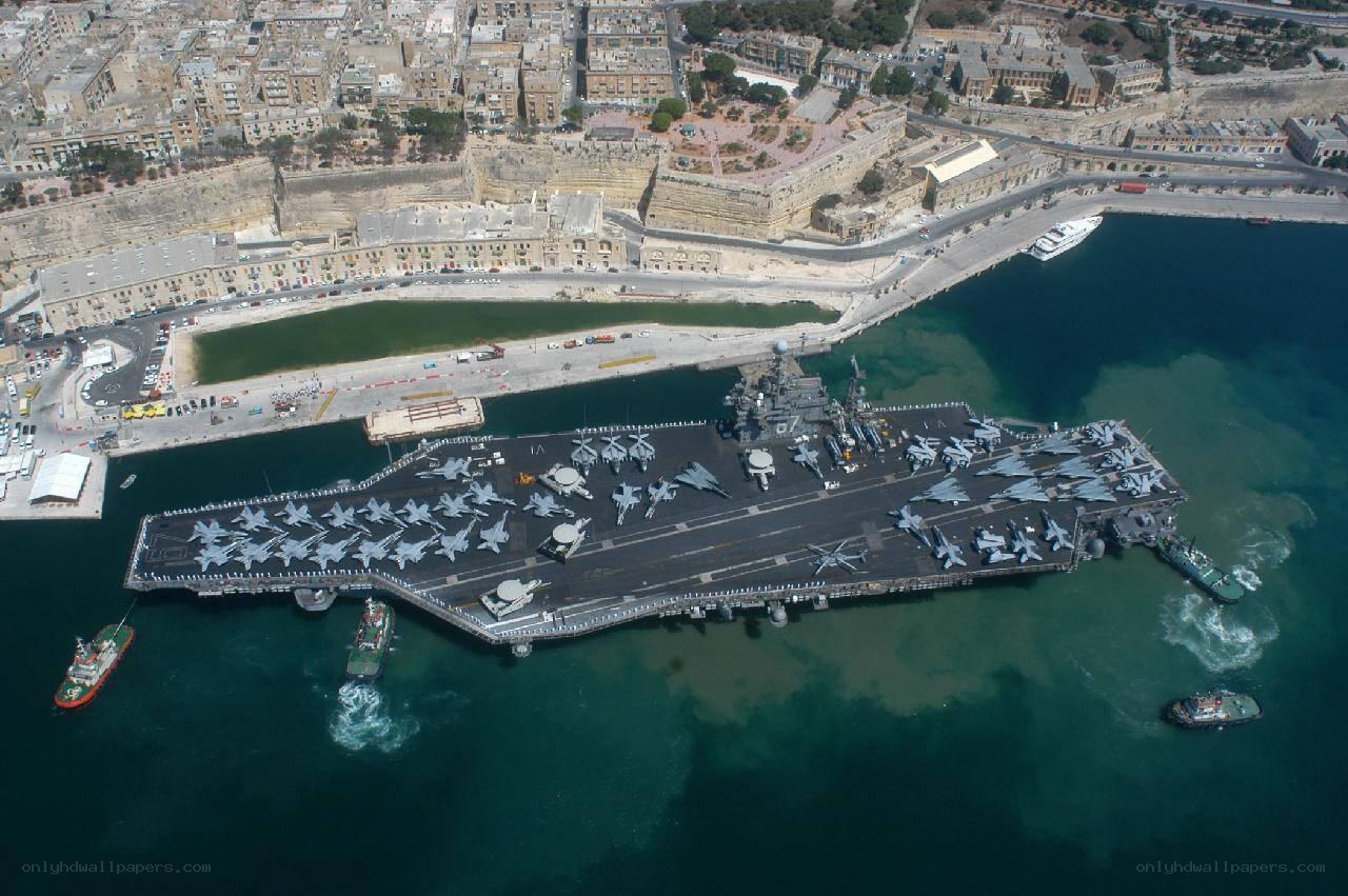 Aircraft carrier in a harbor