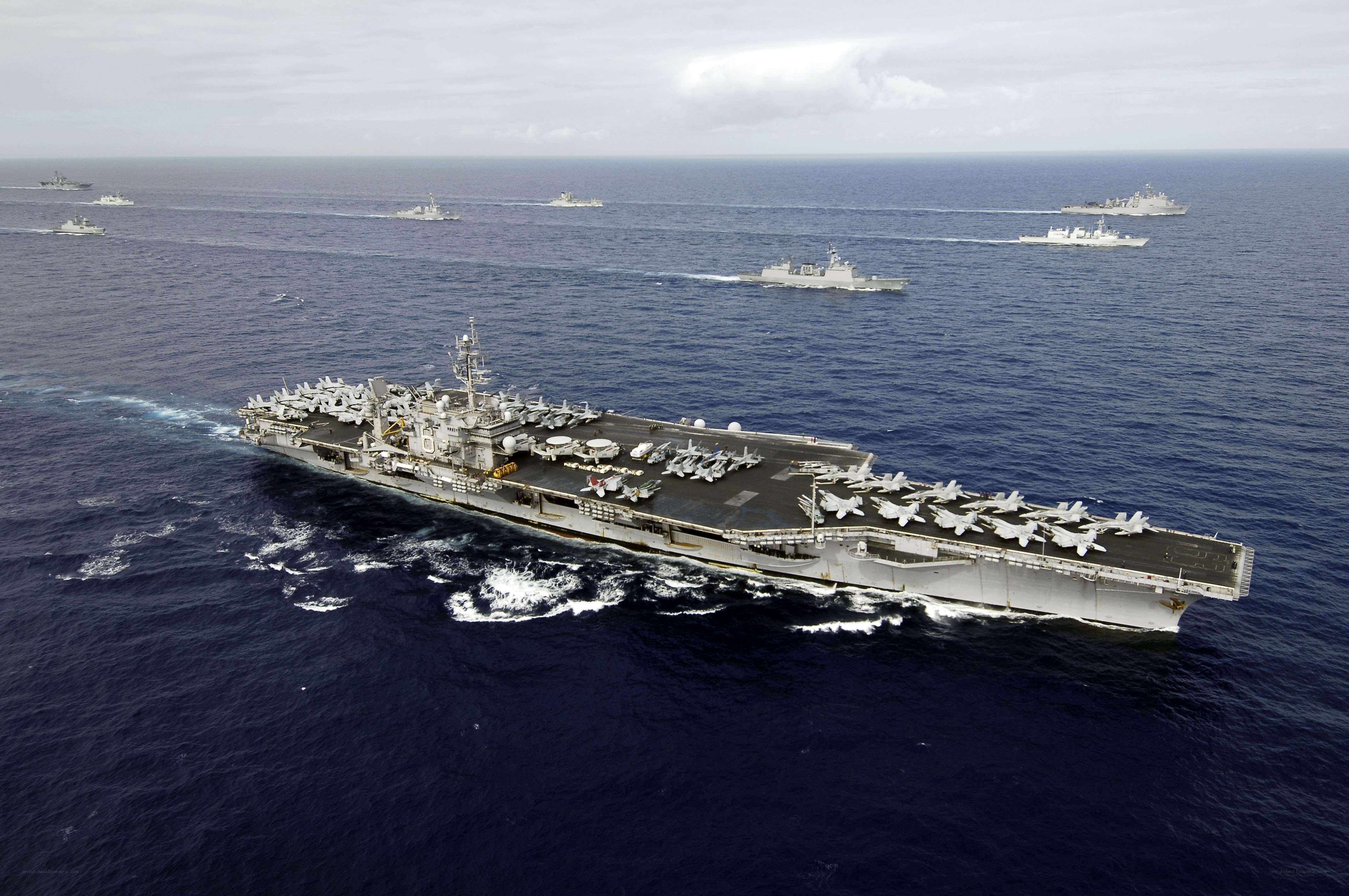 Aircraft carrier in formation