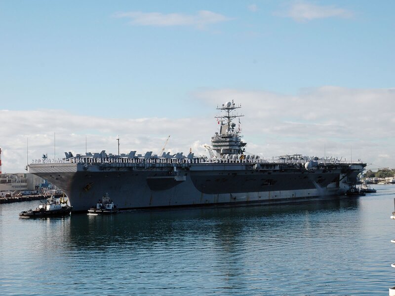 Aircraft Carrier in Harbor — Blue, Calm