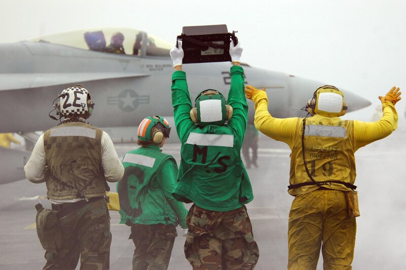 Aircraft crew on an aircraft carrier