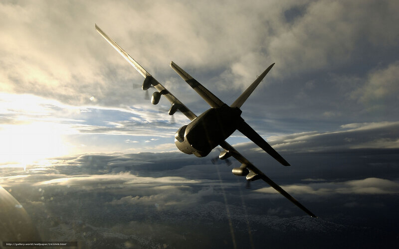 aircraft flying above clouds