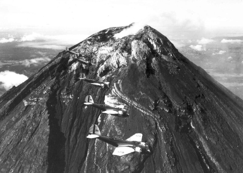 Aircraft flying over a volcano