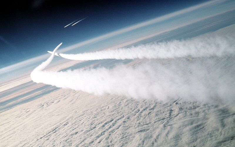 Aircraft Flying over Clouds — White, Dramatic