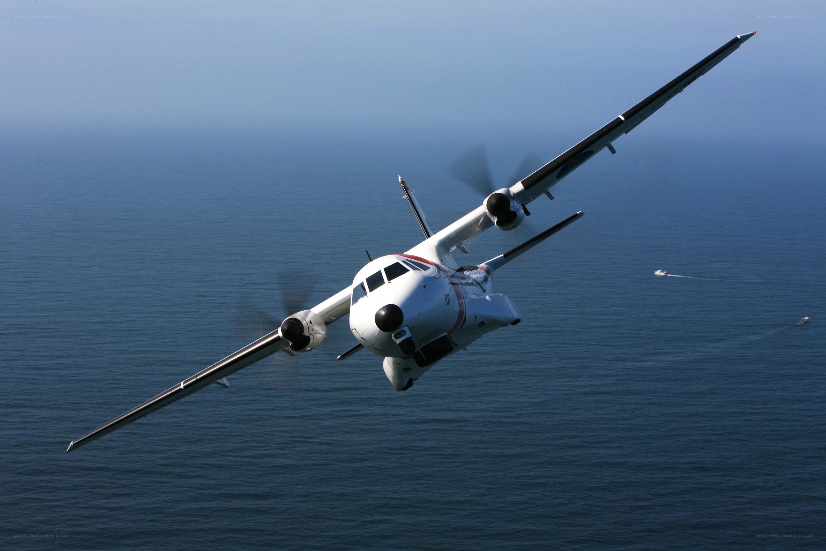 aircraft flying over ocean
