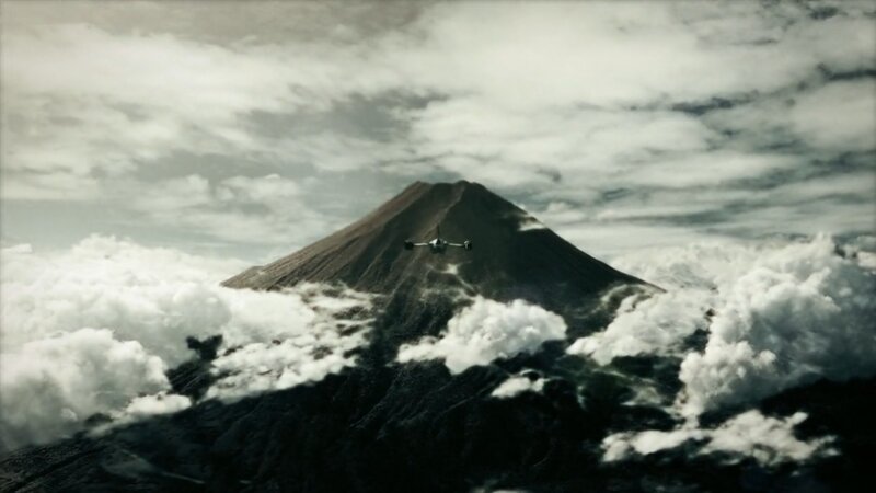 Aircraft Flying over Volcano — Gray