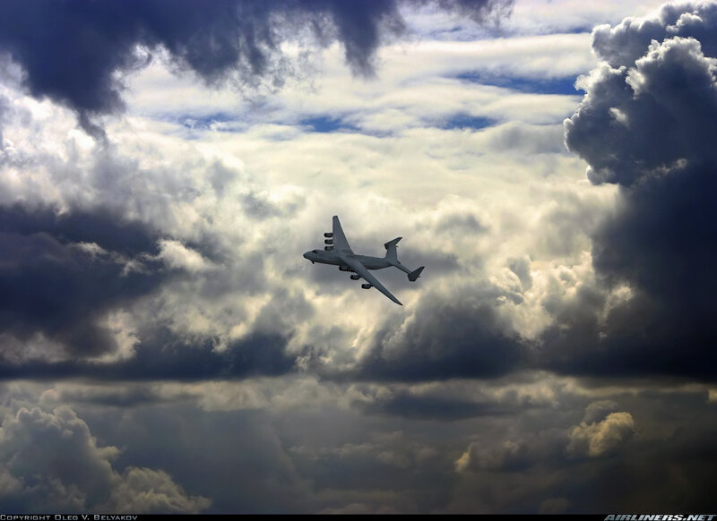 aircraft flying through clouds