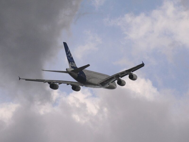 Aircraft in Flight — Blue, Dramatic, Photograph