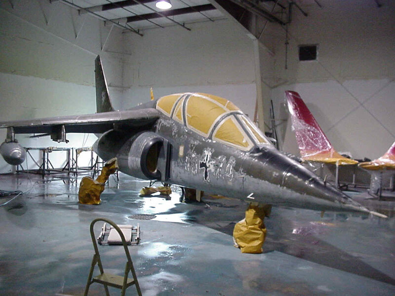 aircraft in hangar under maintenance