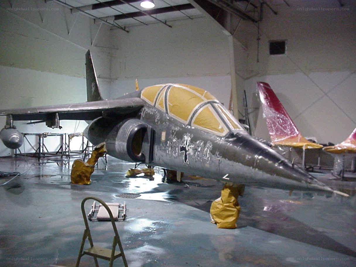 aircraft in hangar under maintenance