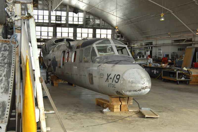 aircraft in hangar undergoing maintenance