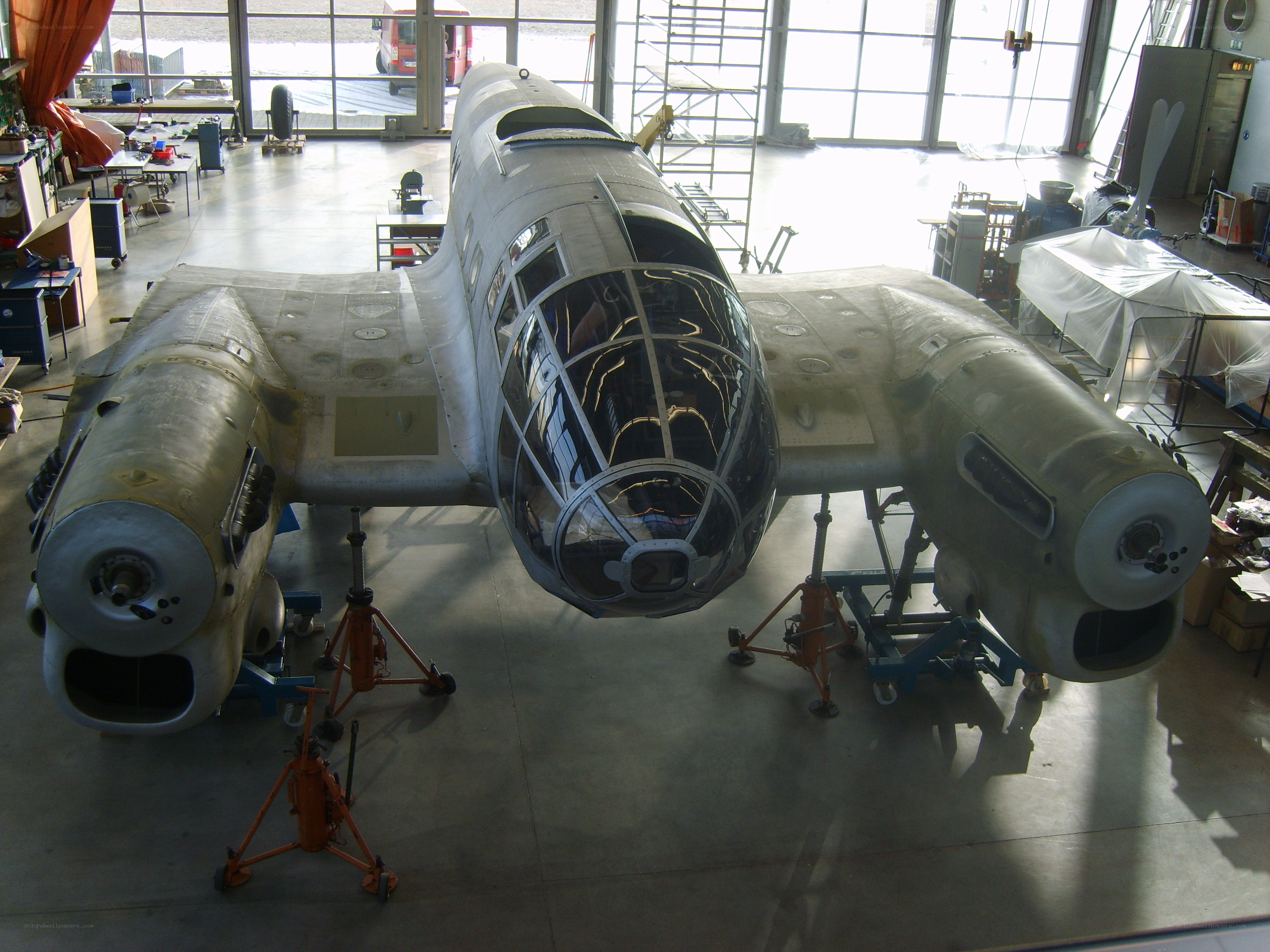 aircraft in hangar undergoing restoration