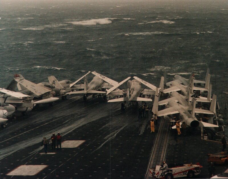Aircraft on a stormy flight deck