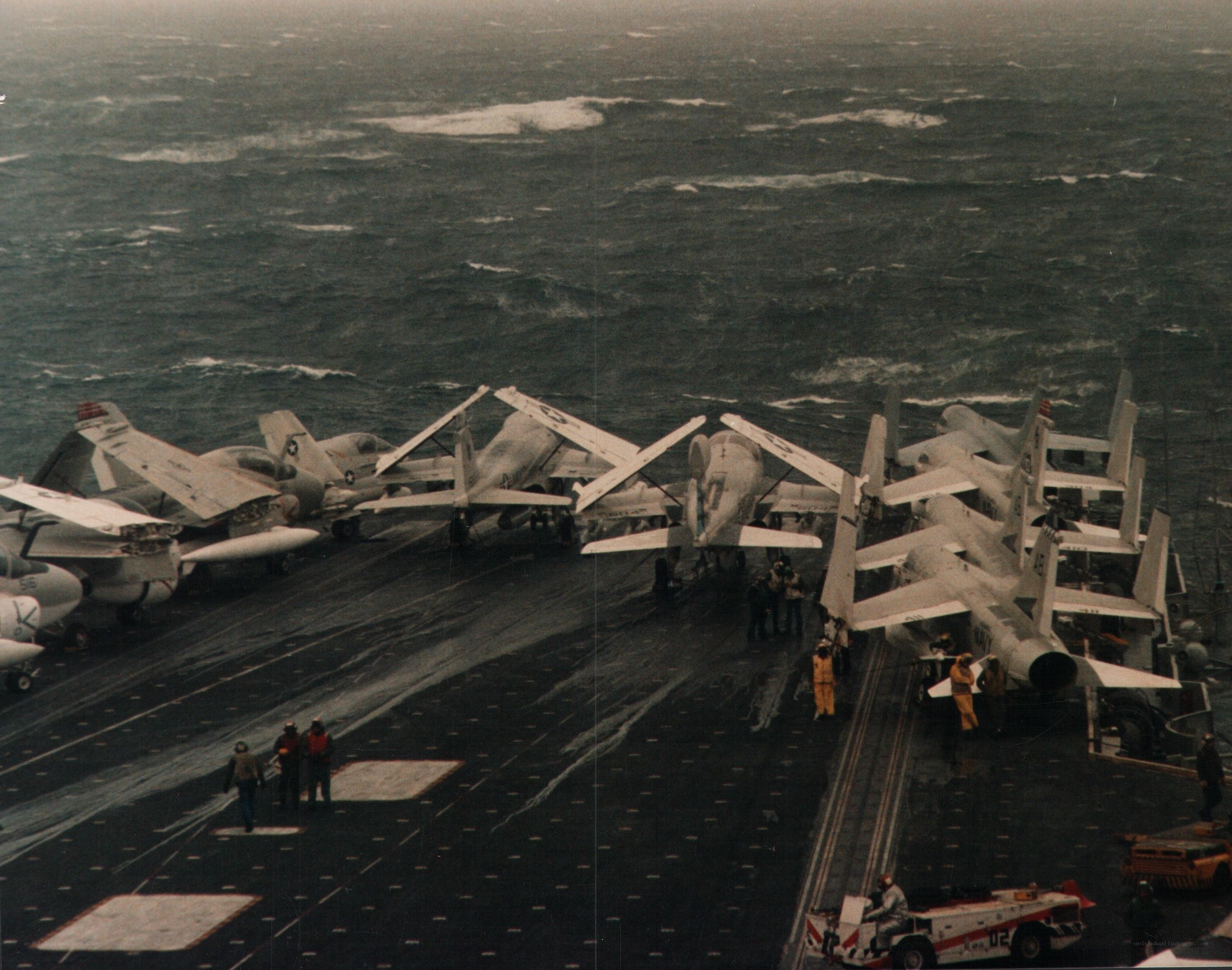 Aircraft on a stormy flight deck