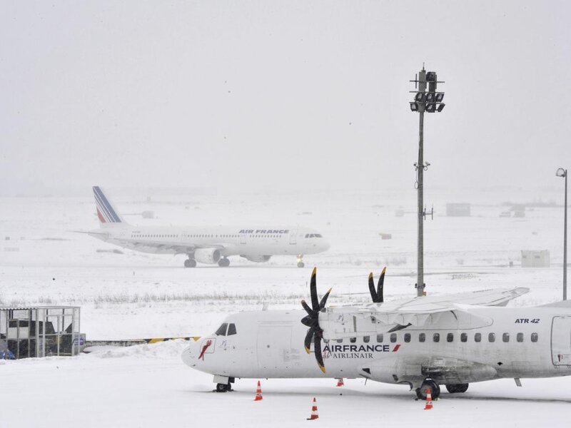 Aircraft on Snowy Tarmac