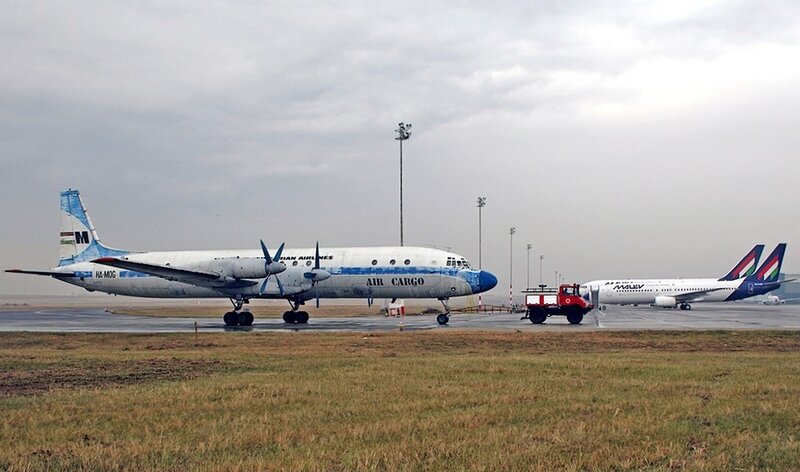 Aircraft on Tarmac — Gray, Overcast