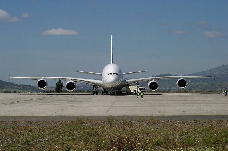 Aircraft on Tarmac — White, Calm