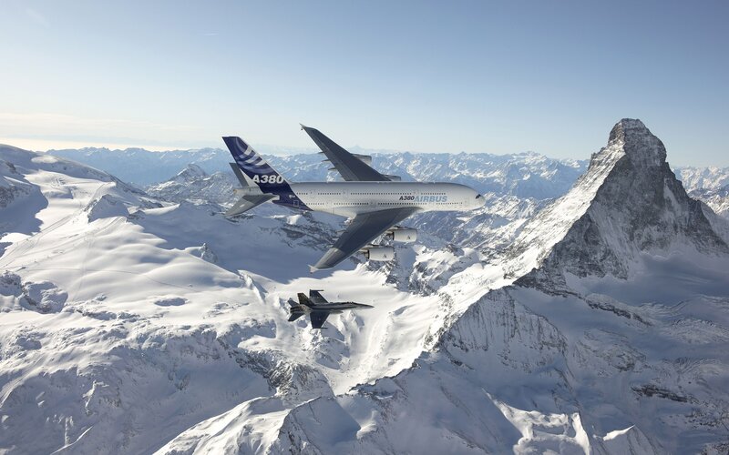 Aircraft over Mountains — White, Dramatic