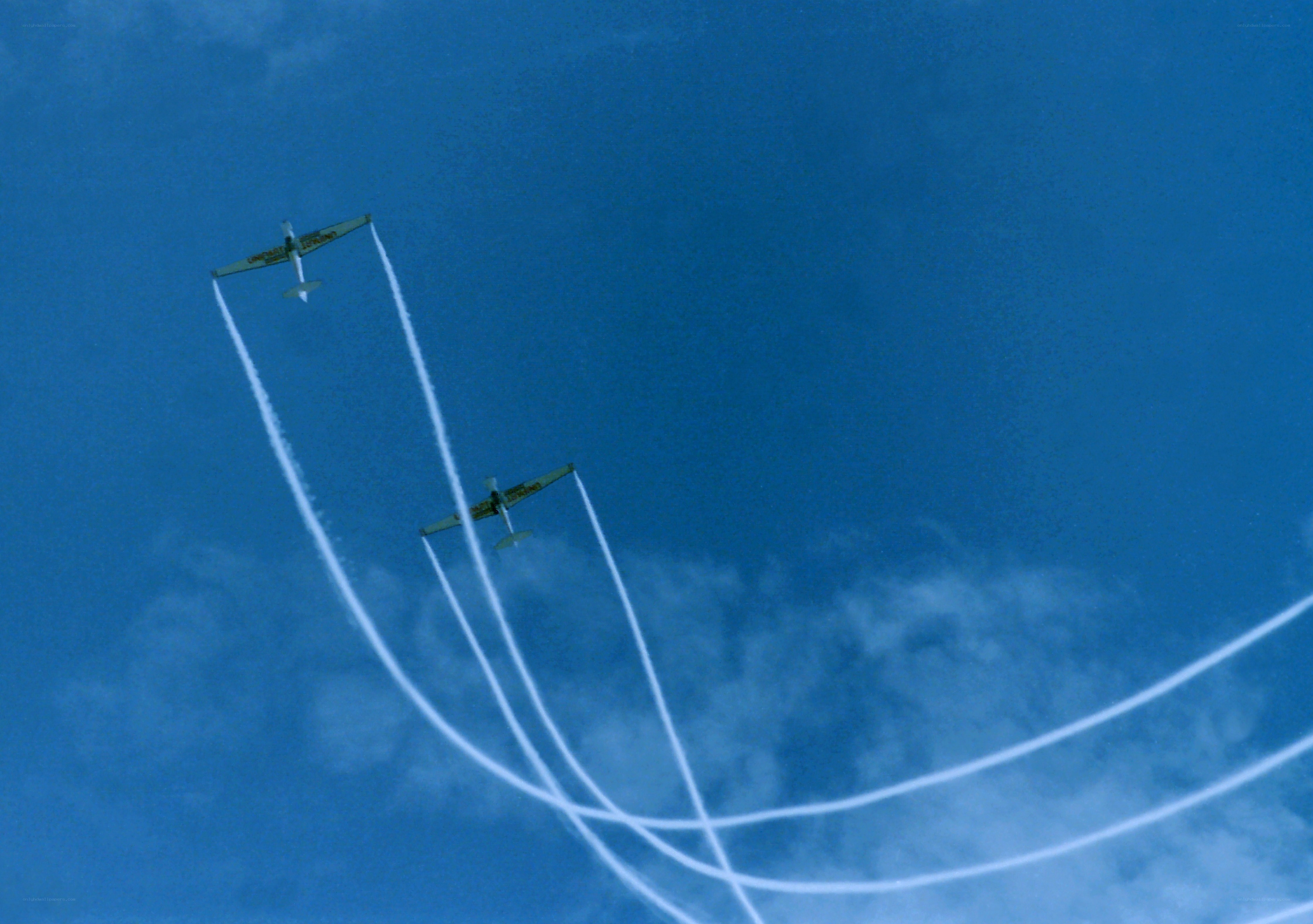 Aircraft performing aerobatic maneuvers