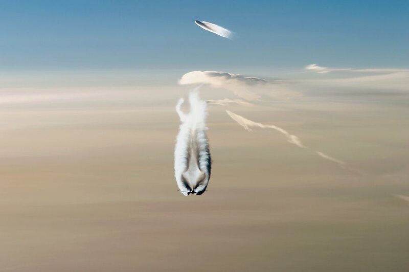 Aircraft Performing Aerobatics — Blue