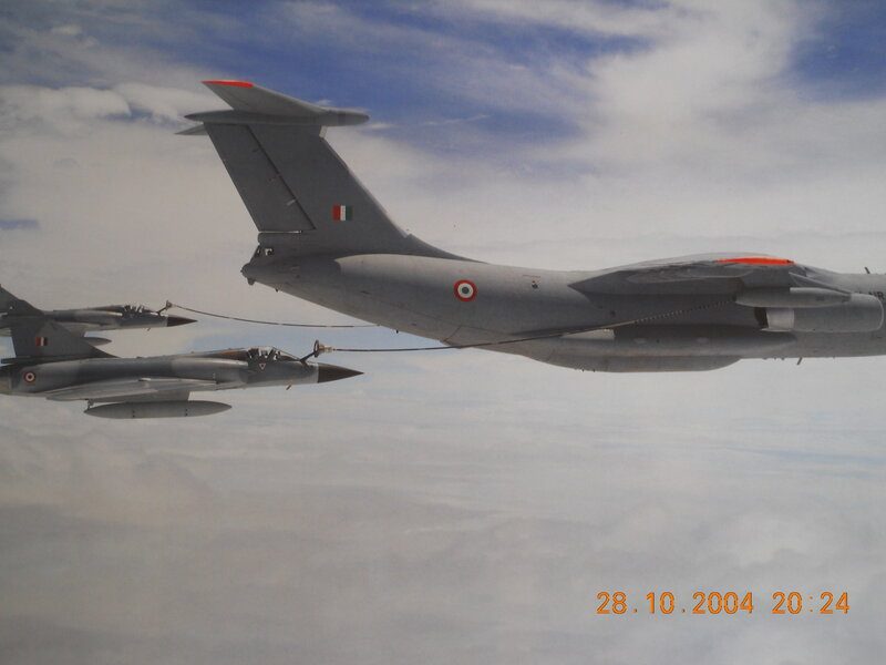 Aircraft Refueling in Flight — Gray, Dramatic