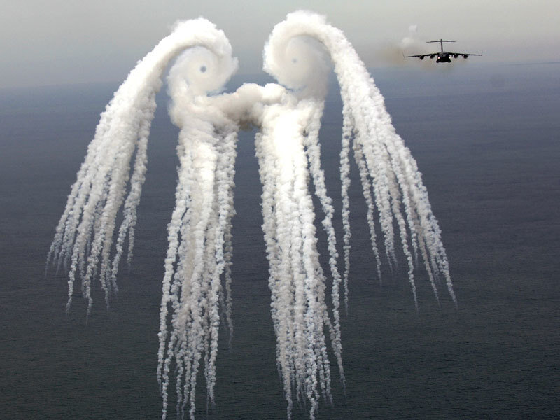 Aircraft Releasing Smoke
